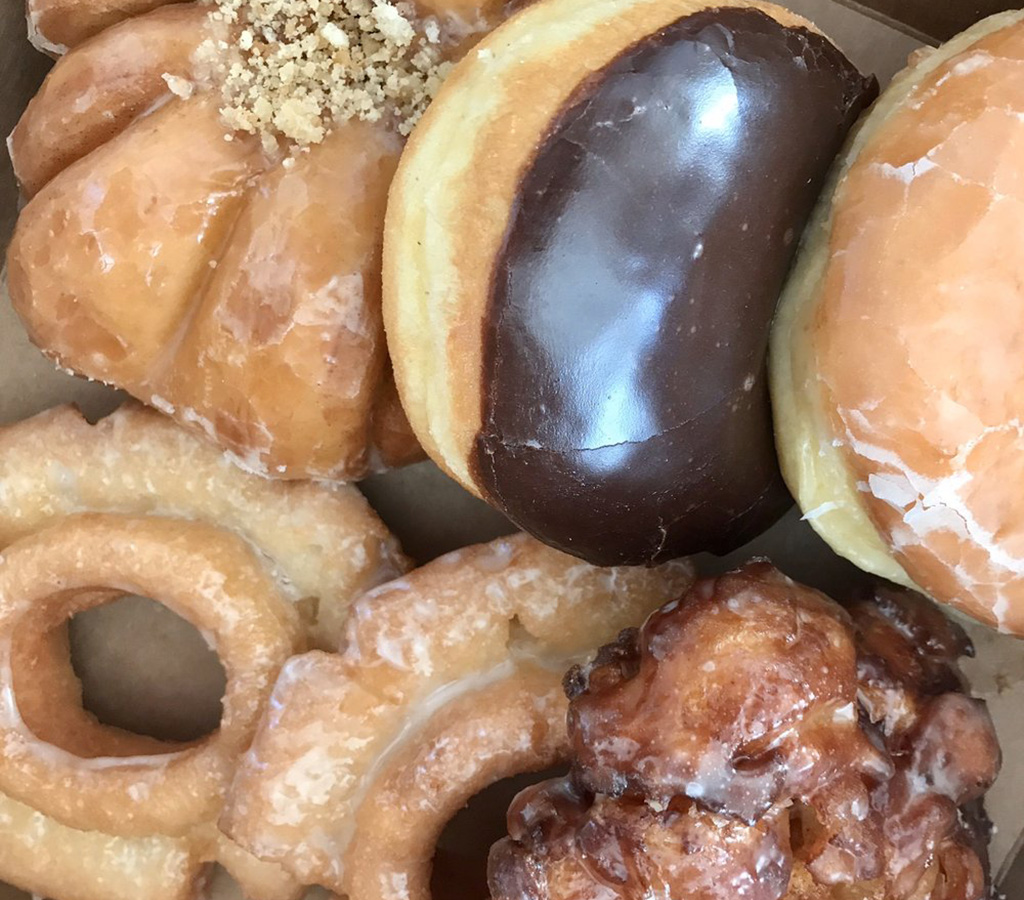 https://yelparticles.wpengine.com/wp-content/uploads/2022/05/19_pana-donuts-coffee-and-boba-tea-indianapolis-assortment-closeup.jpg